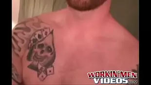 The tattooed man in glasses masturbates to pleasure himself